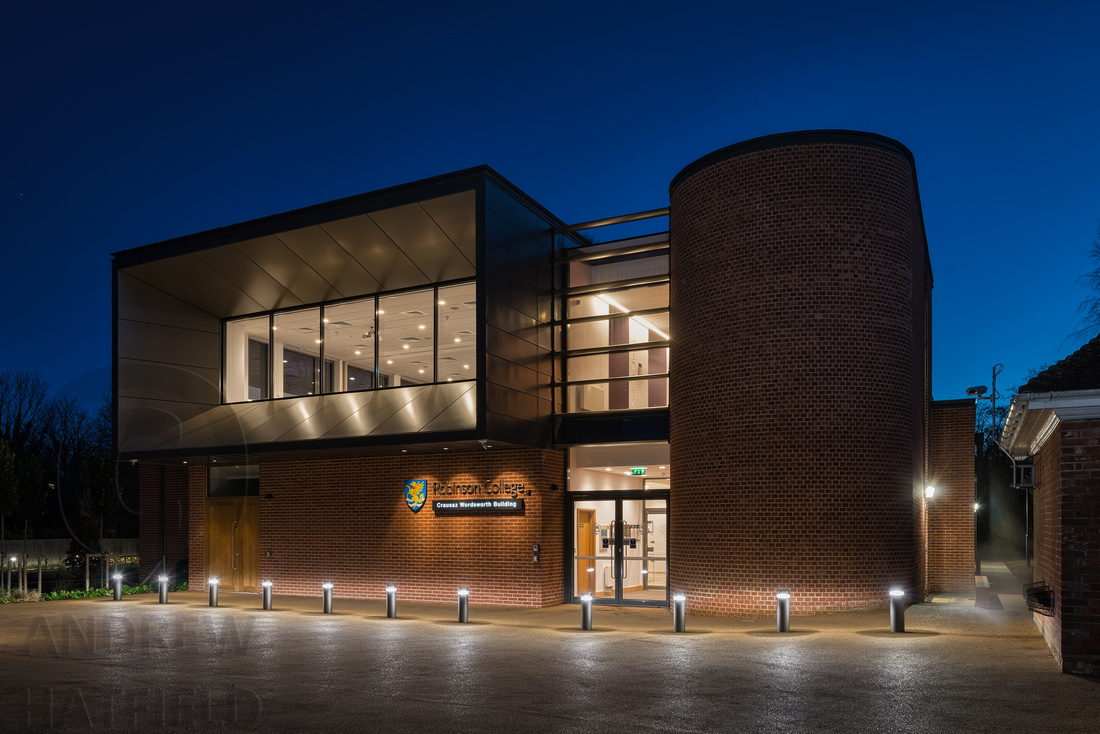 Night photography of the Adams Road elevation of the The Crausaz Wordsworth Building Robinson College Cambridge