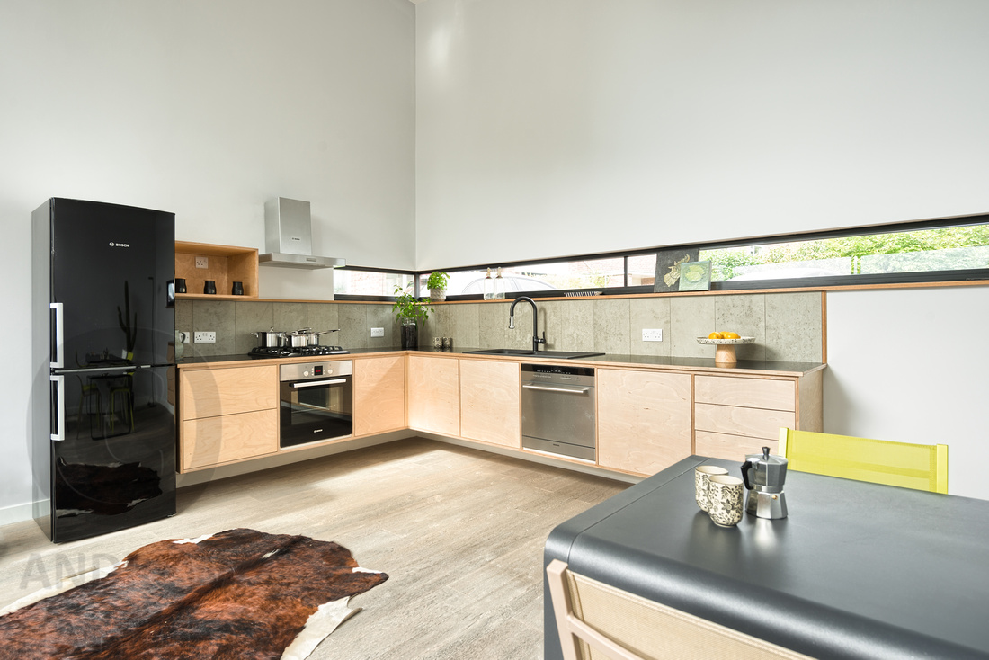 Custom made birch ply kitchen within modular building